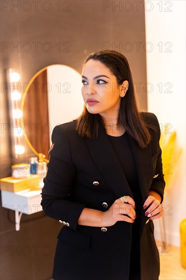 Woman of Latin ethnicity in an aesthetic store of eyebrows and nails