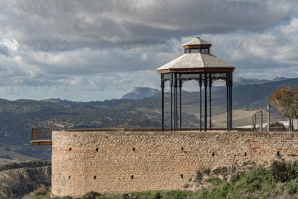 Viewpoint over a mountainous landscape with cloudy sky in the city of ronda malaga