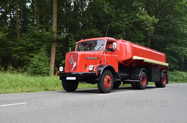 Vintage tanker truck Henschel on the road