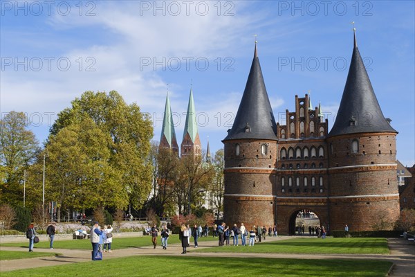 Tourists in front of the Holsten Gate