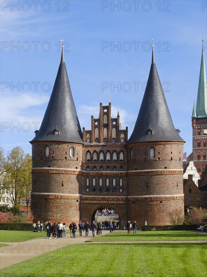 Tourists in front of the Holsten Gate