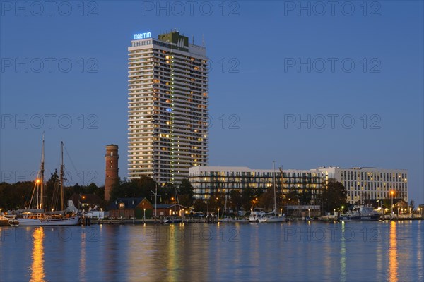 Old lighthouse and Hotel Maritim on the Trave promenade