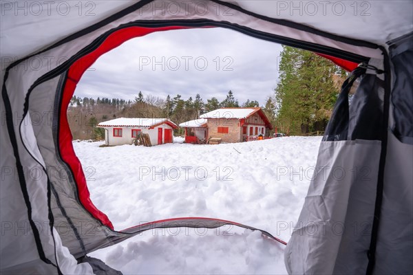 Inside a tent one winter morning