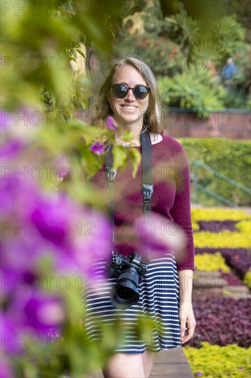 Woman with sunglasses in nature