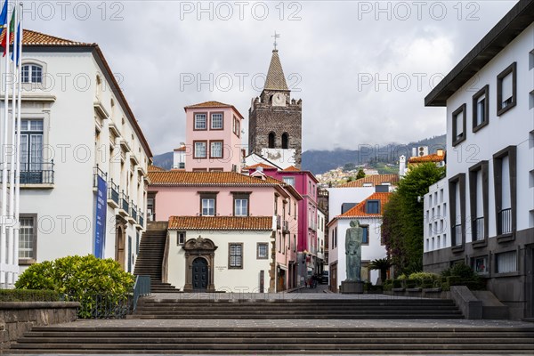 Small square in the old town with colourful houses and chapel Capela de Santo Antonio de Mouraria