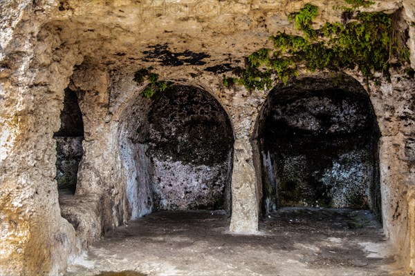 Terrace with images of important deceased carved into the rock