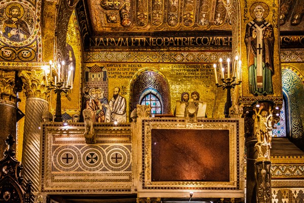 Ambo resting on four columns and Romanesque candelabra