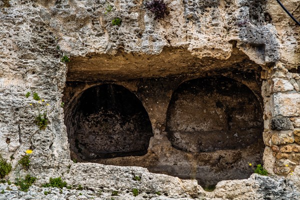 Terrace with images of important deceased carved into the rock