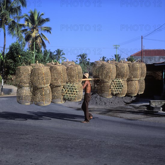 Man carrying baskets