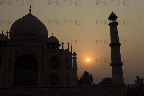 Taj Mahal backlit by the rising sun