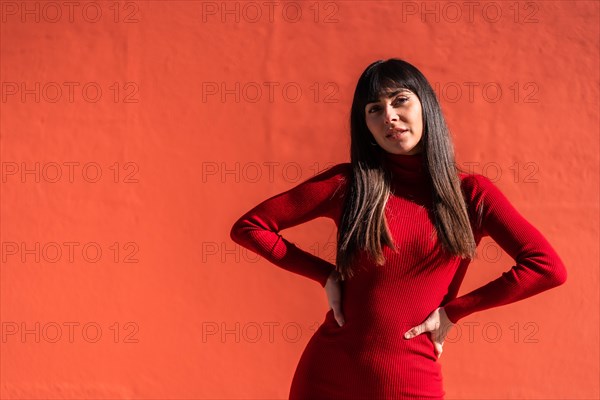 Posed brunette girl with a dress in spring