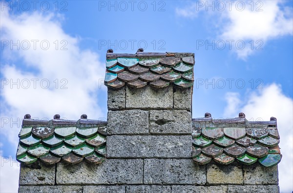 Architectural detail stepped gable with tile roofing
