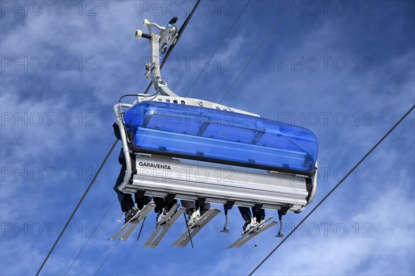 Chairlift skier