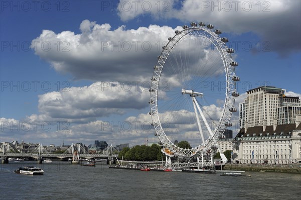 The London Eye Ferris Wheel on the banks of the Thames