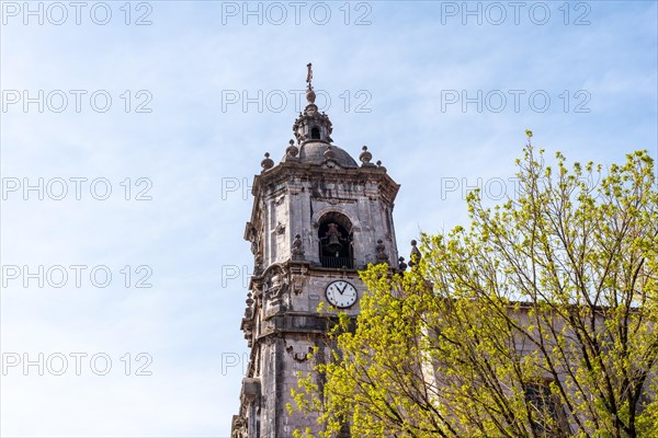 Clock tower of the parish of San Martin in the goiko square next to the town hall in Andoain