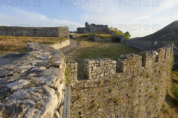 Walls of Rozafa castle ruins in the evening light
