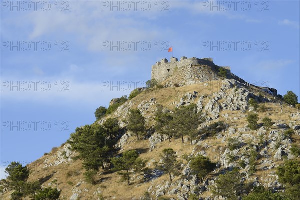Rozafa Castle with Albanian flag