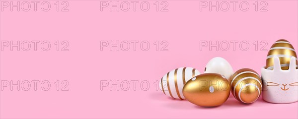 Pink Easter banner with eggs with dots and stripes