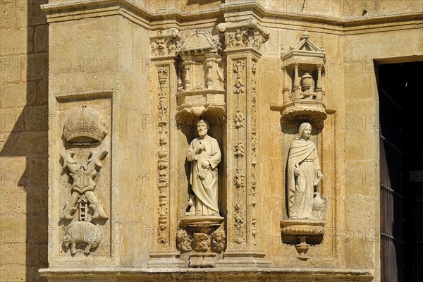Detail at the main entrance on the left of the basilica Cathedral of Santa Maria la Menor