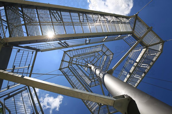 Steel observation tower and suspension bridge on the Iller in fine weather