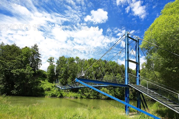 Steel suspension bridge over the Iller in fine weather