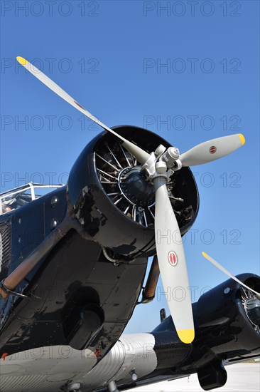 Propeller plane Ju 52 on the tarmac