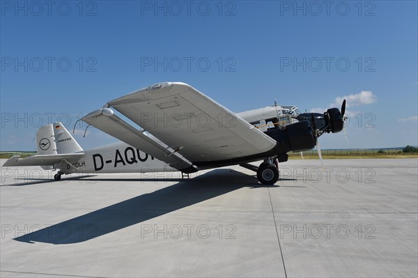 Propeller plane Ju 52 on the tarmac