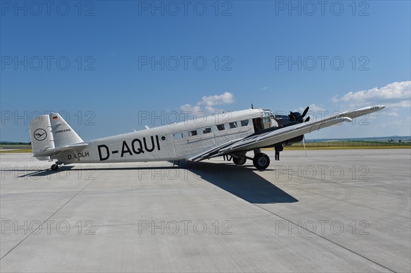 Propeller plane Ju 52 on the tarmac