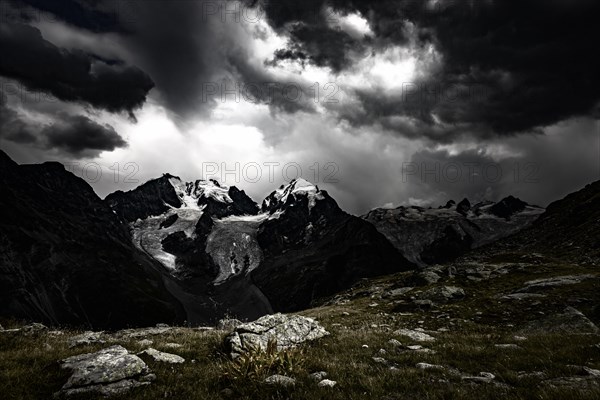 Summit of the Bernina Group with dramatic clouds