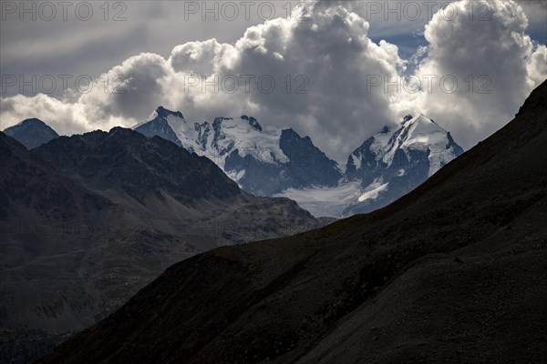 Bernina Group and Engadine Mountains with Cloudy Sky