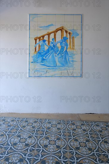 Painting with bullfighter and Roman temple in the Plaza de Toros in Merida