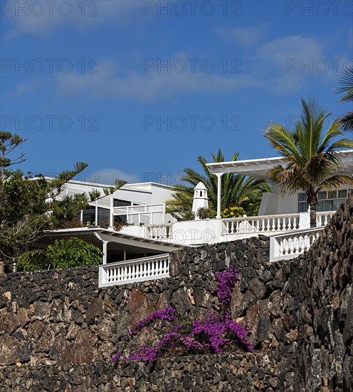 Luxury villas on the harbour promenade of Puerto Calero