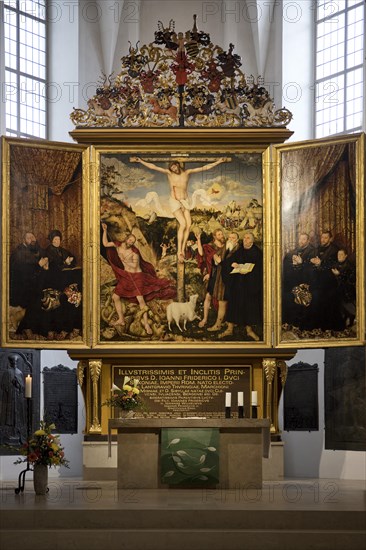 Interior view with altarpiece by Cranach