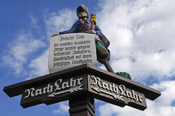 Wooden carved signpost to Lahr