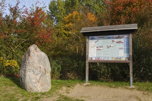 Information board and memorial stone at the former border to the GDR