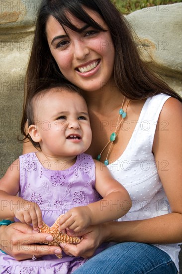 Young mother with baby girl