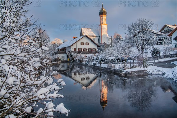 Uffinger Ach with parish church in winter