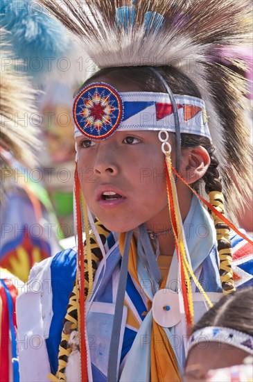 Young boy in traditional regalia at the T'suu Tina pow-wow