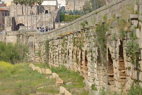 Historic UNESCO Puente Romano bridge as part of the Roman city of Emerita Augusta in Merida