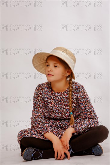 Girl sitting cross-legged