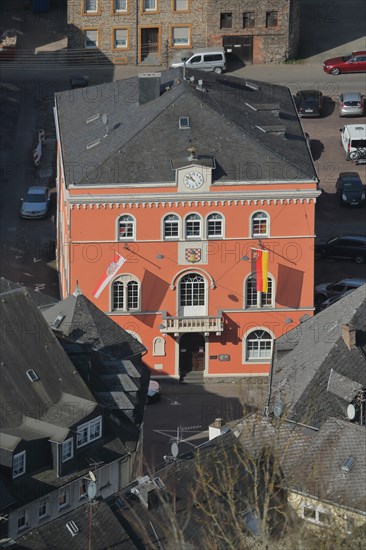 Historic town hall built 1833 with national flag and state flag