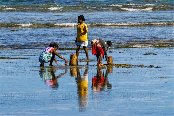 Locals fishing in the waters of the Island Ile Sainte Marie