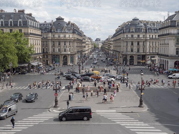 View from the balcony of the Opera Garnier building onto the Pl. de lOpera towards Av. de lOpera