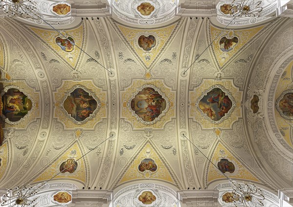 Ceiling vault with stucco work in the baroque town parish church of St. Oswald