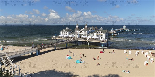 Pier and beach chairs on the beach of Sellin