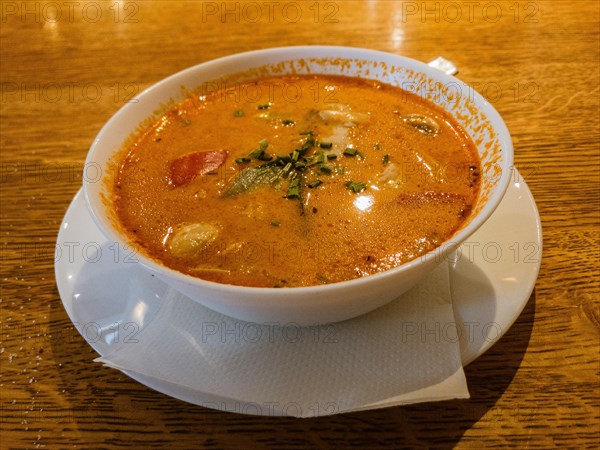 Spicy Thai soup with coconut and chicken