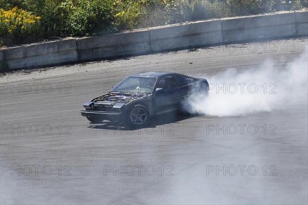 Car performing a skid test