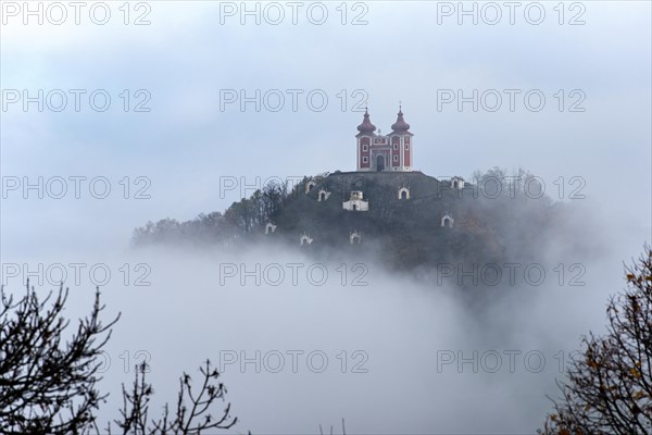 Calvary over clouds of fog