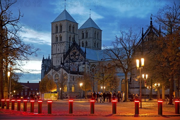 Red luminous bollards on the Domplatz with St. Pauls Cathedral