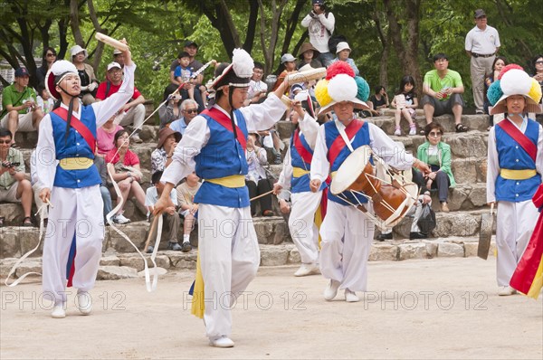 Members of a traditional farmers dance troupe